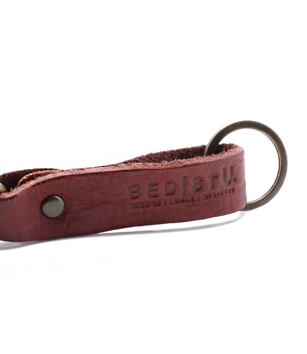A leather Keygrab with the brand name Bed Stu on it.