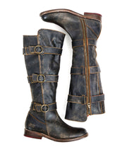 A pair of Kitty brown, knee-high leather boots by Bed Stu, featuring buckles and side zippers for an edgy sophistication and customizable fit, displayed side by side.