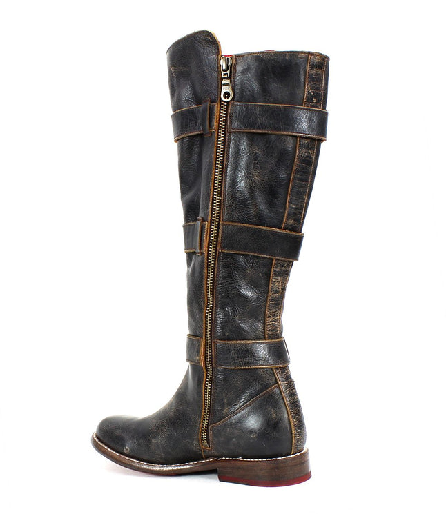 A single tall Kitty leather boot by Bed Stu, featuring adjustable straps, a side zipper, and a worn vintage look.