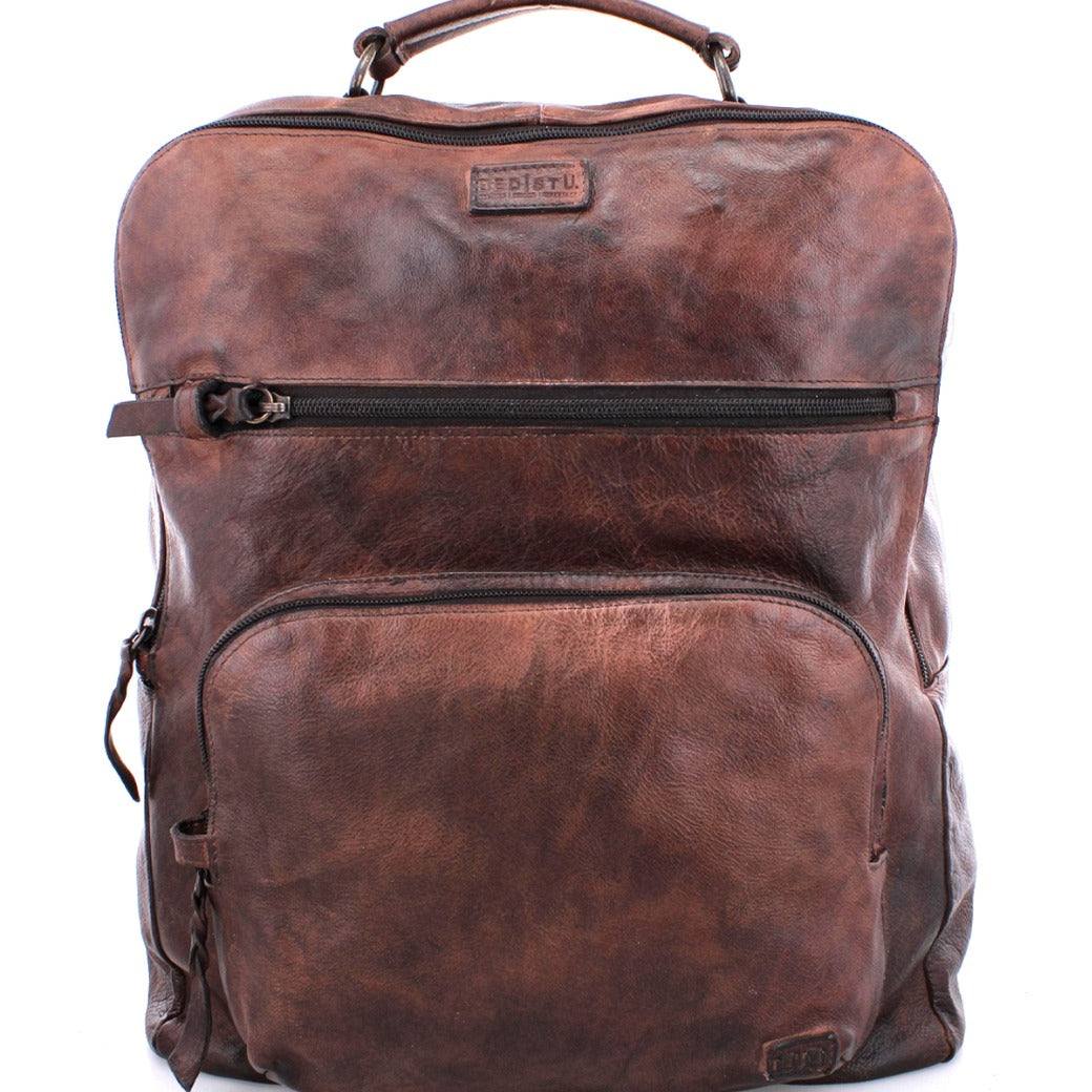 A Bed Stu Lafe brown leather backpack on a white background.