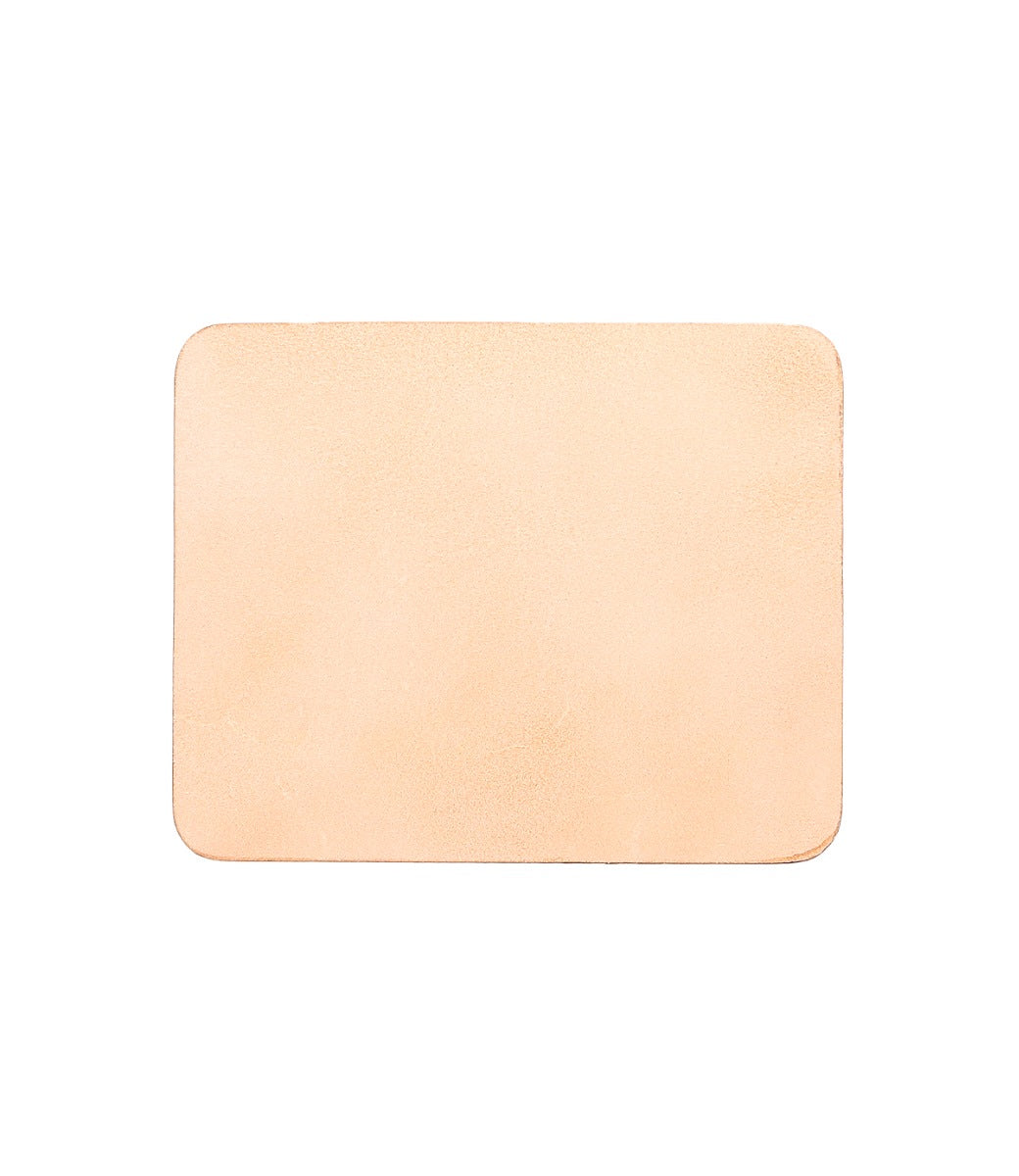 A beige piece of Bed Stu leather on a white background.