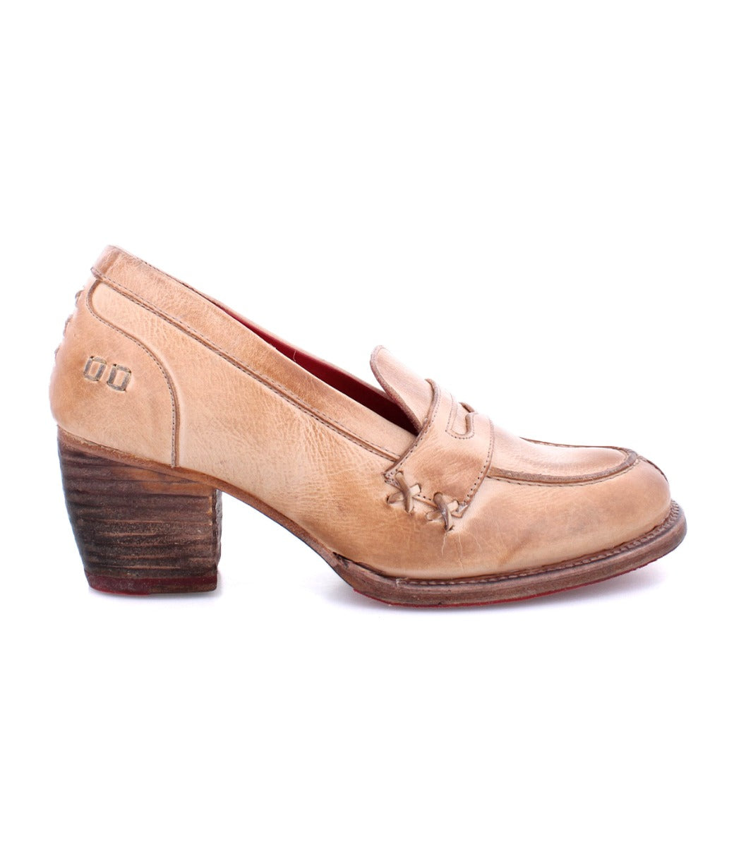 A women's beige Liberty loafer with a wooden heel, made by Bed Stu.