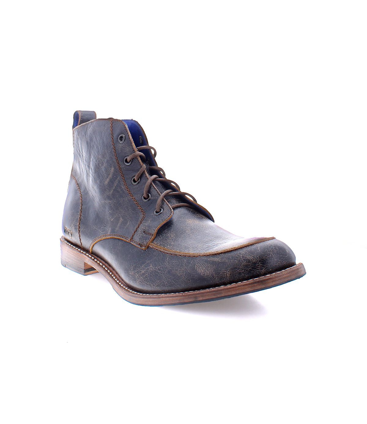 The Lincoln II by Bed Stu is a classic lace-up brown leather boot with subtle stitching set against a white background, ideal for achieving a dressed-up look.