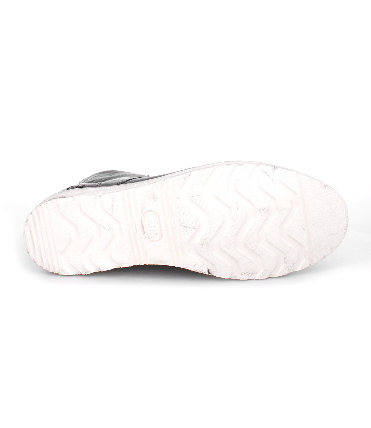 Sole of a men's leather boot with zigzag tread pattern and visible Bed Stu logo, displayed against a plain white background.