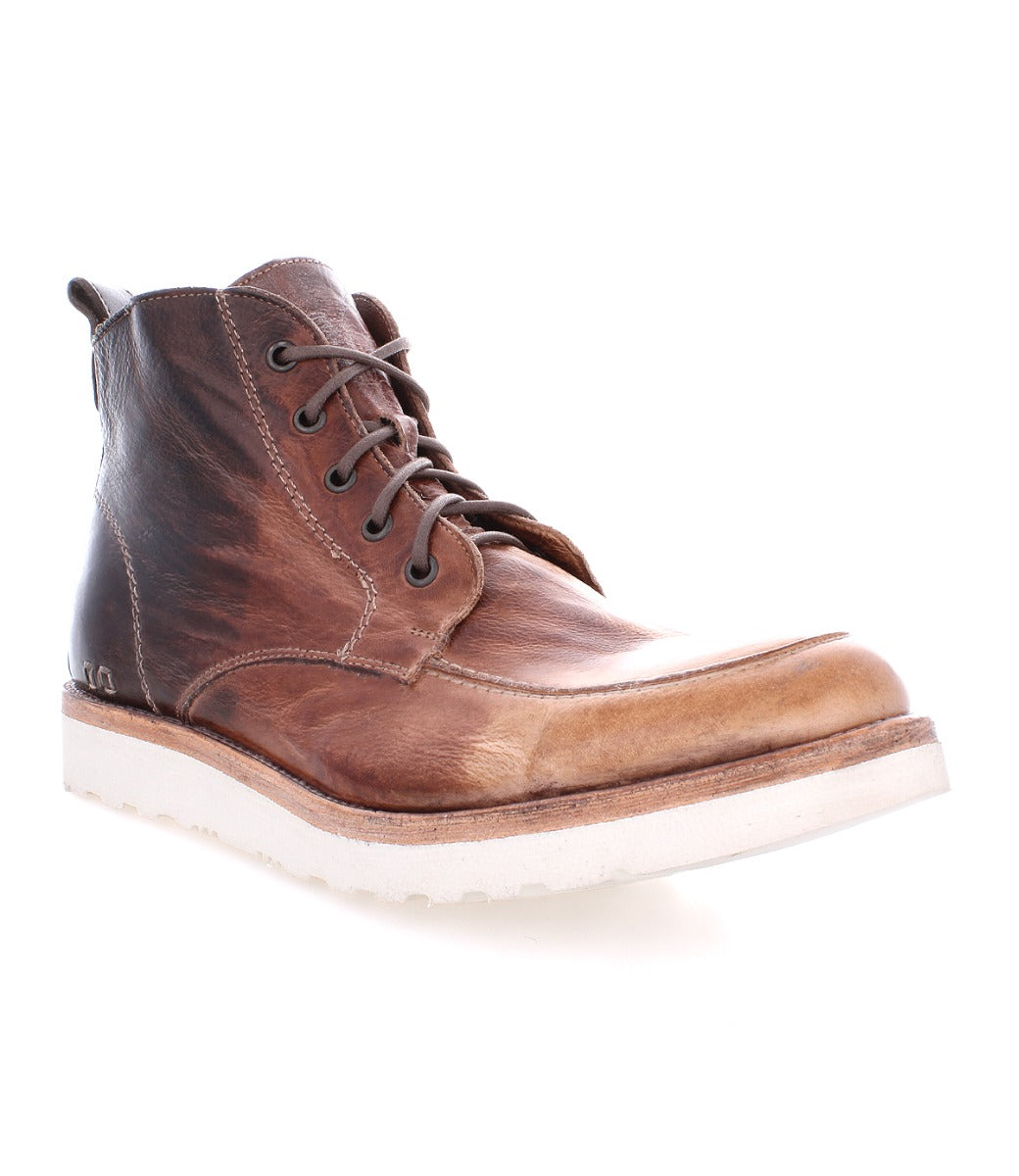Side view of a single men's Bed Stu Lincoln brown leather work boot with laces on a white background.