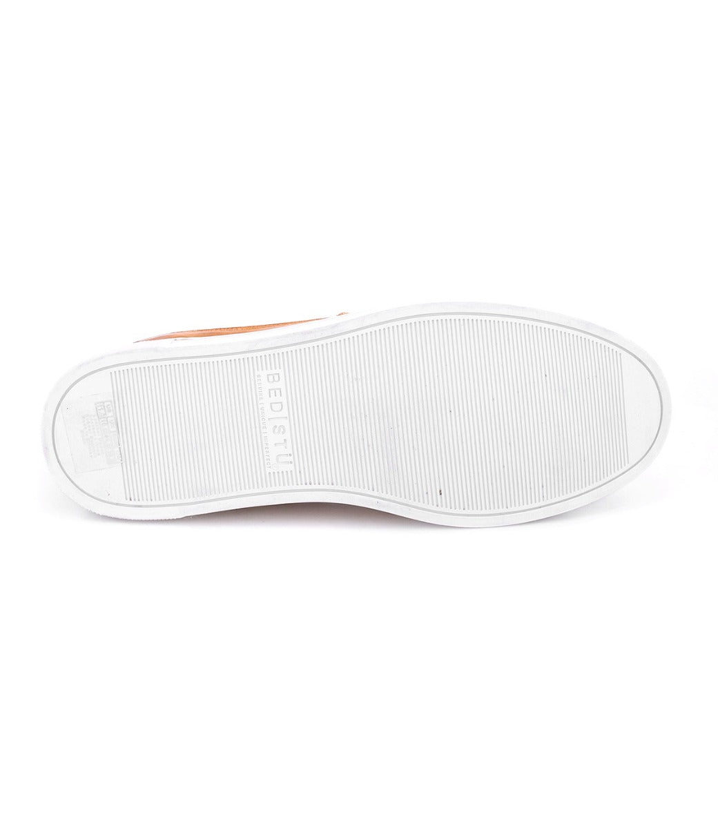 A pair of Lordmind sneakers in orange and white on a white background by Bed Stu.