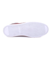 A pair of Lordmind shoes with a white sole and a red sole by Bed Stu.