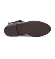 The back view of a women's Bed Stu black leather shoe.