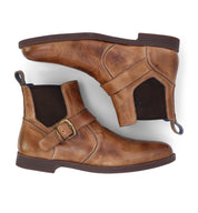 A pair of brown Michelangelo chelsea boots with buckles by Bed Stu.