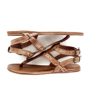 A pair of Bed Stu Moon sandals with straps and buckles.