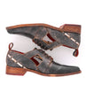 A pair of Neftis men's shoes with brown leather and wooden soles from Bed Stu.