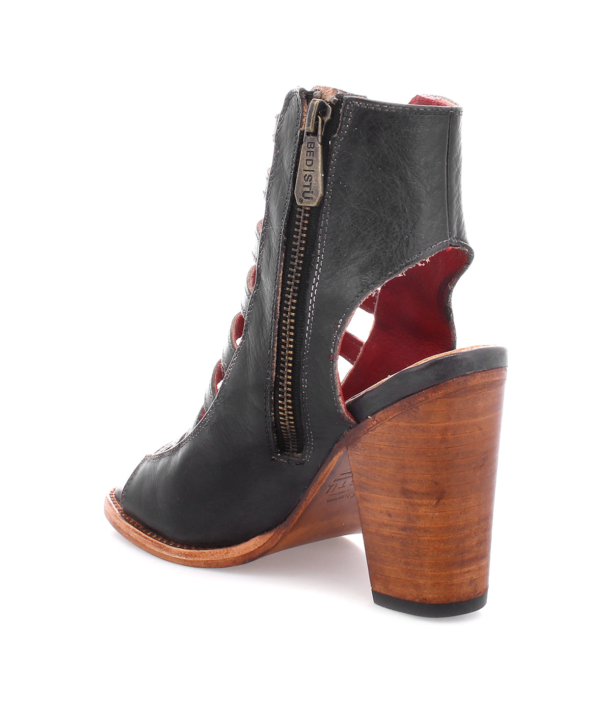 A cushioned footbed enhances the comfort of this Bed Stu Occam boot with a wooden heel.