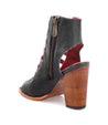 A cushioned footbed enhances the comfort of this Bed Stu Occam boot with a wooden heel.