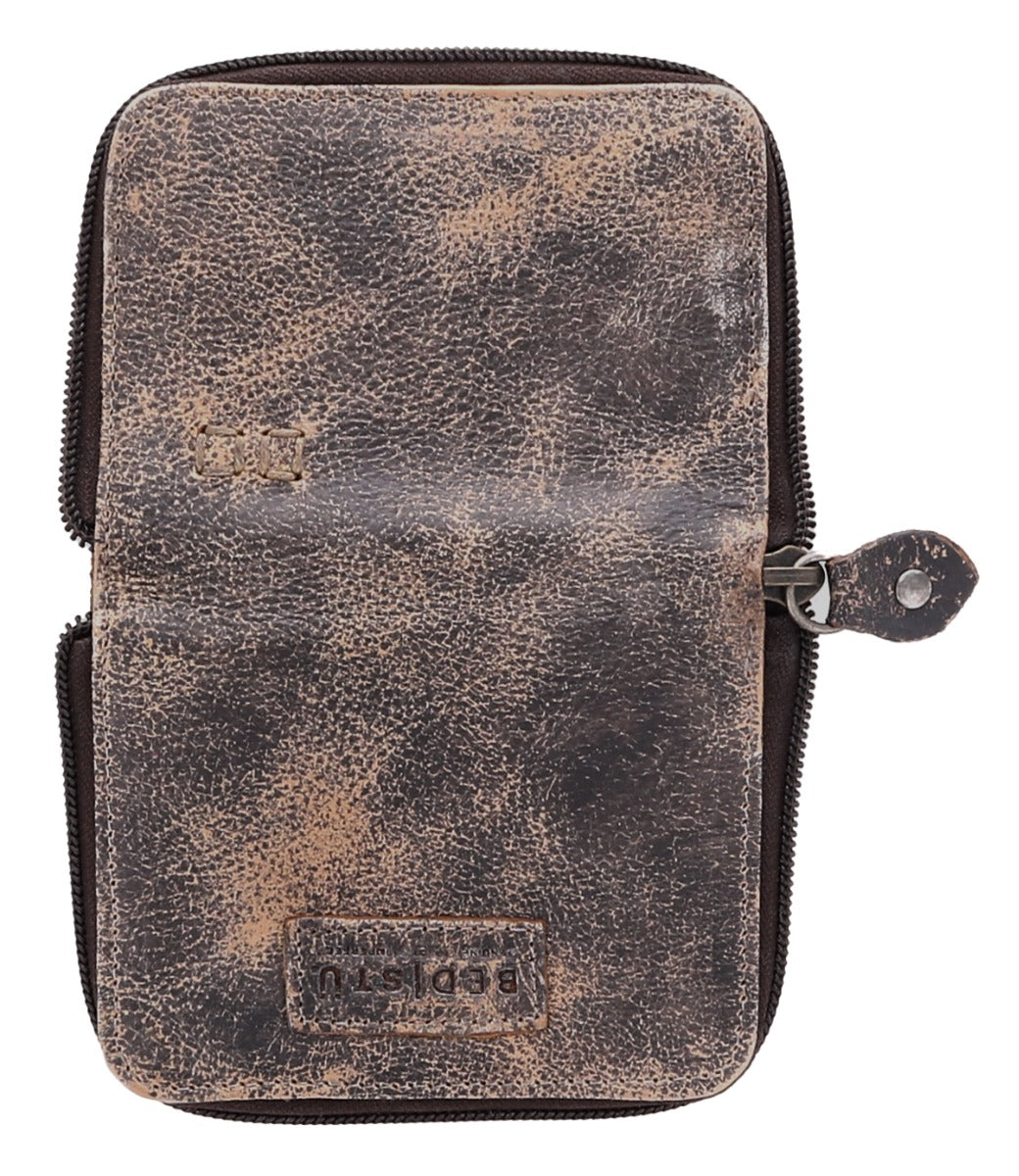 A brown leather Ozzie wallet with a zipper, by Bed Stu.
