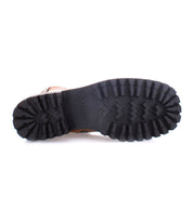 A durable close-up of the sole of a brown leather Bed Stu Ploy shoe.