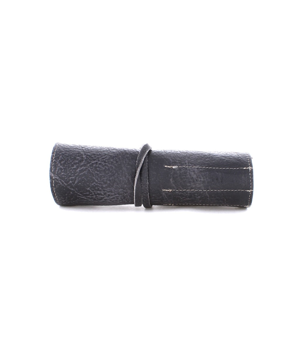 Prepped Leather Wrap from Bed Stu, perfect for securing artist tools with its sturdy strap.