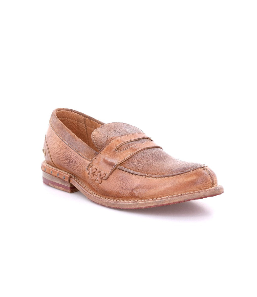 A women's tan Reina loafer on a white background. (Bed Stu)
