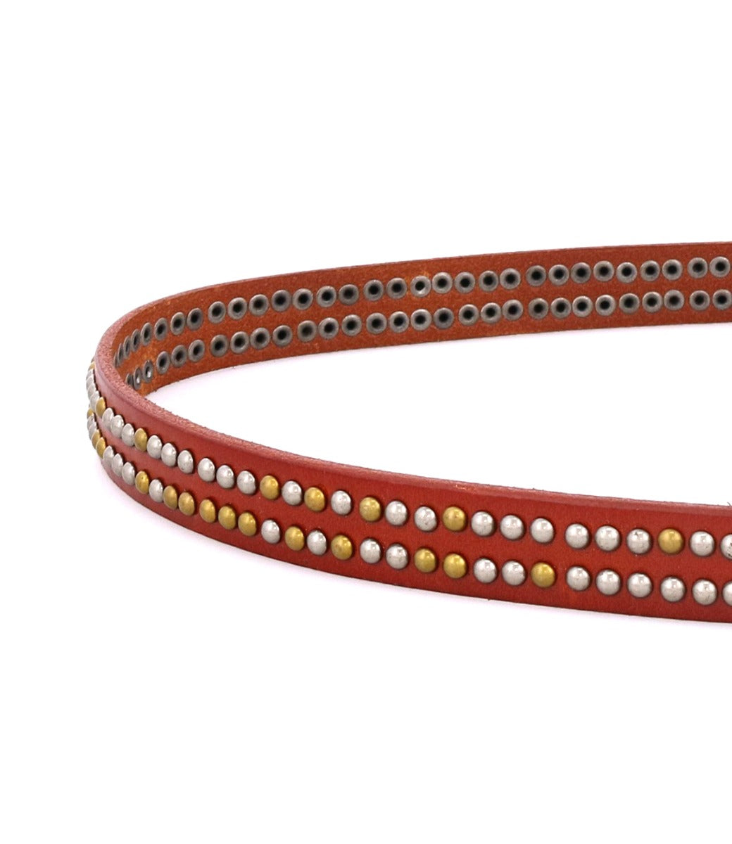 A red leather Rico belt with gold and silver studding by Bed Stu.