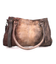A Rockababy brown leather handbag with a handle from Bed Stu.