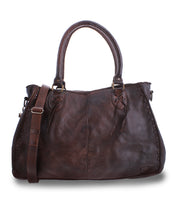 The Rockaway handbag from Bed Stu, crafted from luxurious brown leather, is a best-seller featuring two handles and a well-organized interior. It also includes a detachable shoulder strap for versatile styling options.