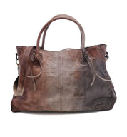 A brown leather Rockaway tote bag with handles from Bed Stu.