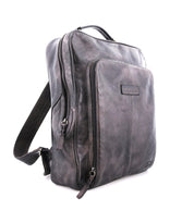 A Rozes by Bed Stu grey leather backpack on a white background.