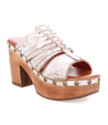 A women's white platform sandal with a wooden heel, named Shantel by Bed Stu.