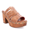 A women's sandal with a wooden platform and straps, called the Shantel by Bed Stu.