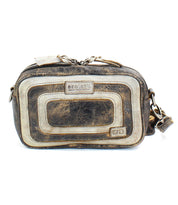 Introducing the Shy by Bed Stu, a compact crossbody crafted from worn leather. This bag showcases a front embossed design and proudly displays a logo label at the top. Its contrasting leather accents enhance its style, making it perfect for an organizational pro on the go.