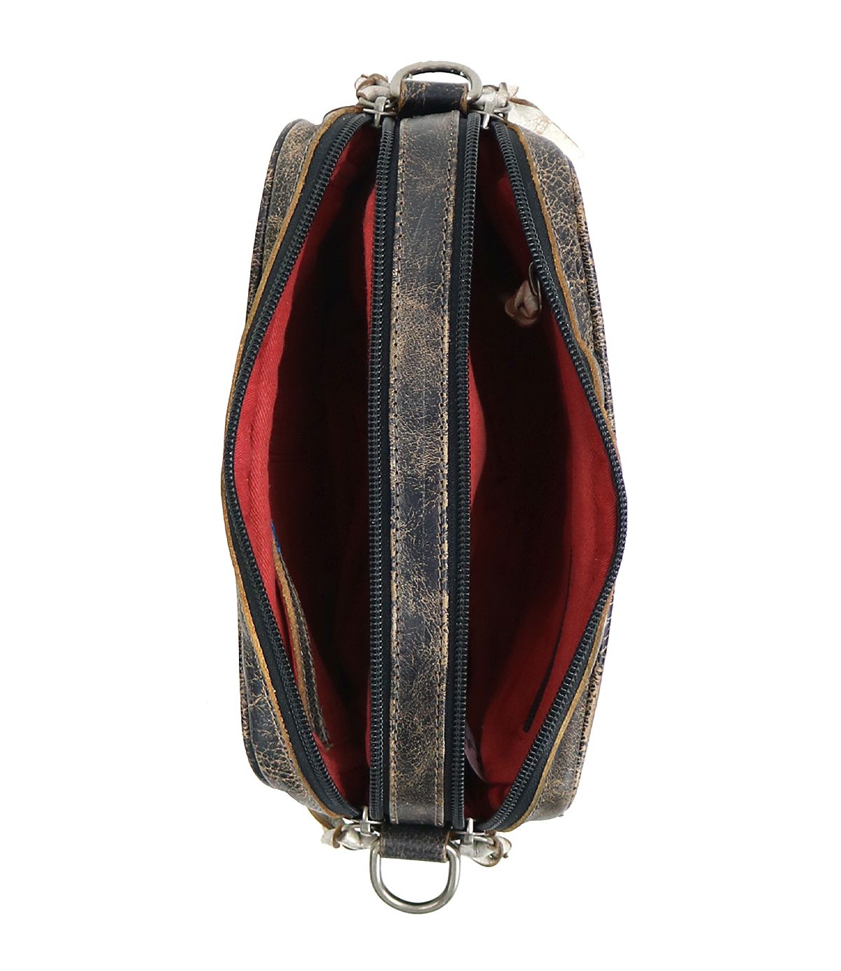 Top view of an open Bed Stu Shy crossbody bag made from textured dark leather, featuring two organizational compartments lined in red fabric and adorned with silver hardware.