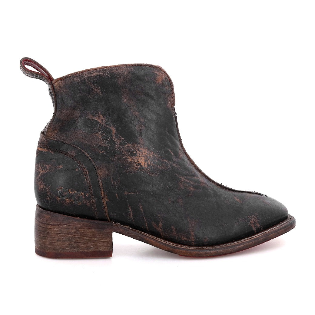 A black leather ankle boot with a wooden heel called the Tabitha by Bed Stu.