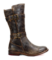 A single, weathered brown Turn short leather boot by Bed Stu, featuring Goodyear welted construction with two brass buckles and a low heel, photographed from the side against a white background.
