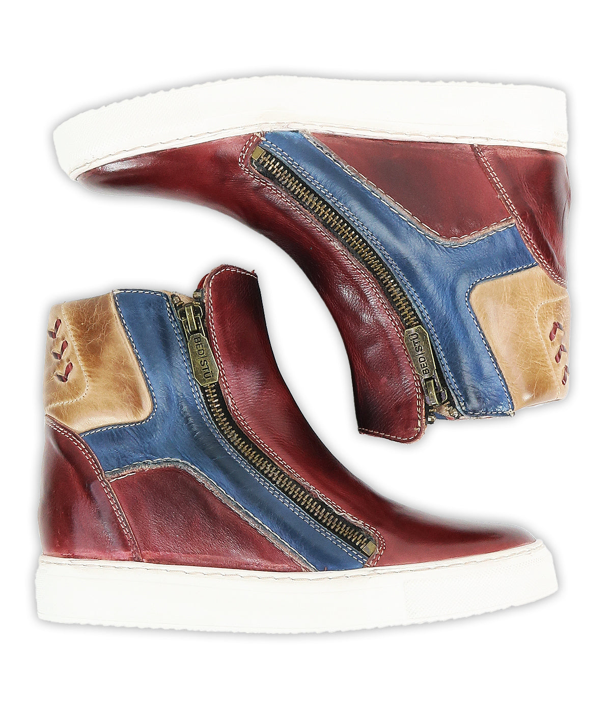 Bed Stu 'Twist' leather high-top sneakers feature red, blue, and tan leather panels, white soles, hidden wedge heels, and side zippers, displayed with inner sides facing up.