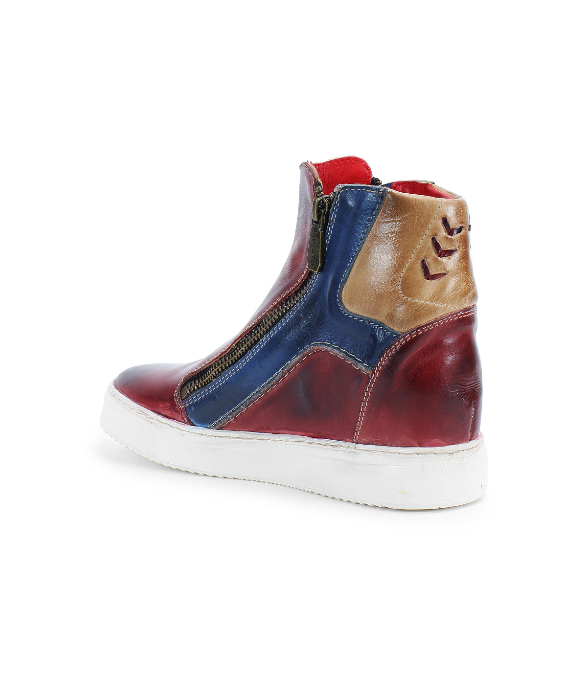 The Bed Stu Twist is a high-top sneaker featuring red, blue, and tan leather panels, a hidden wedge for added height, side zipper, white sole, and decorative heel stitching.