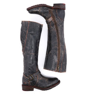 A pair of Bed Stu women's Glaye boots with zippers on the side.