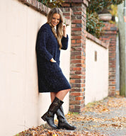 A woman in a pair of Bed Stu Gogo Lug boots.