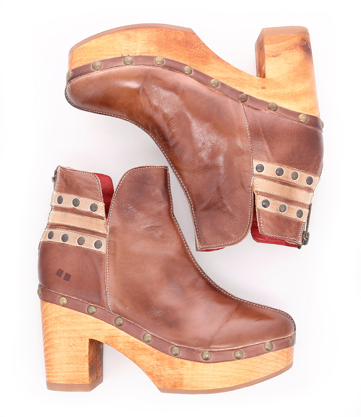 A pair of Viena brown leather booties by Bed Stu with wooden heels and stud detail.