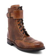 A brown, vegetable tanned leather Walker boot by Bed Stu with a buckle strap at the top, isolated on a white background.