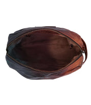 The inside of a Yatra brown leather bag by Bed Stu.