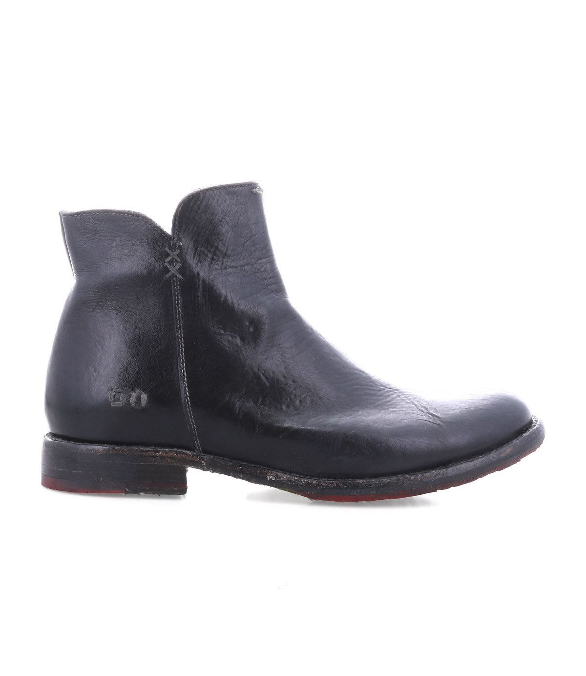The Bed Stu Yurisa is a black leather ankle boot with visible stitching, a low heel, and red leather lining, shown in a side view on a white background—a stylish everyday choice.