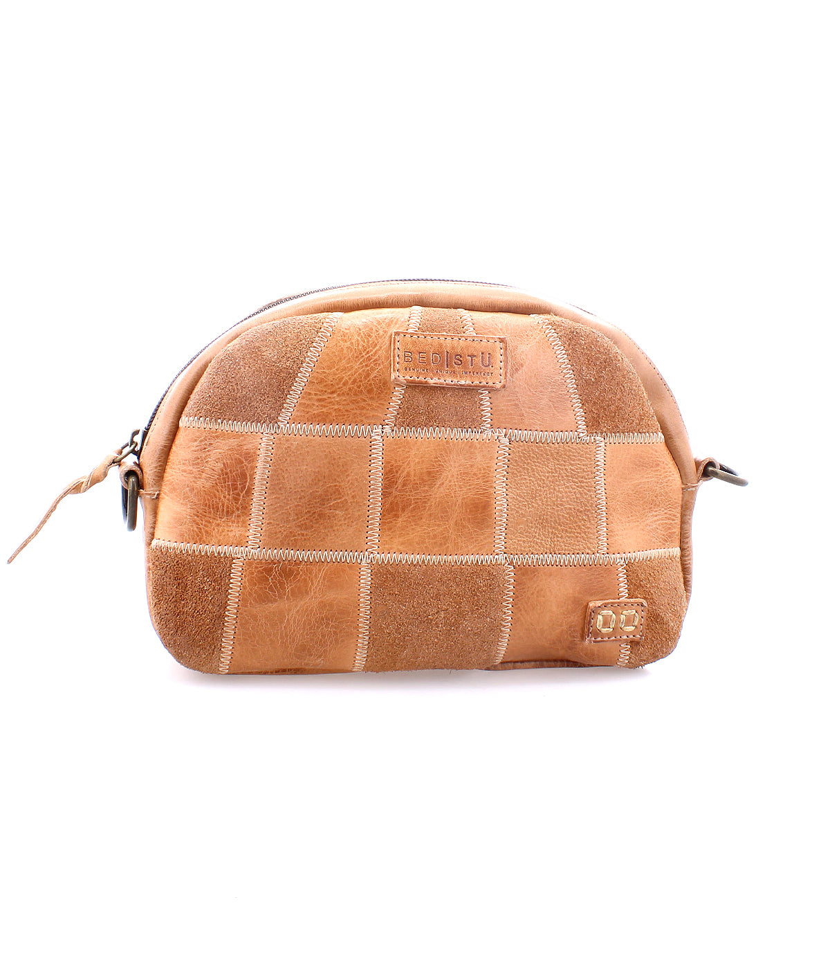 Abundance by Bed Stu leather sling bag with quilted design and zipper, isolated on white background.