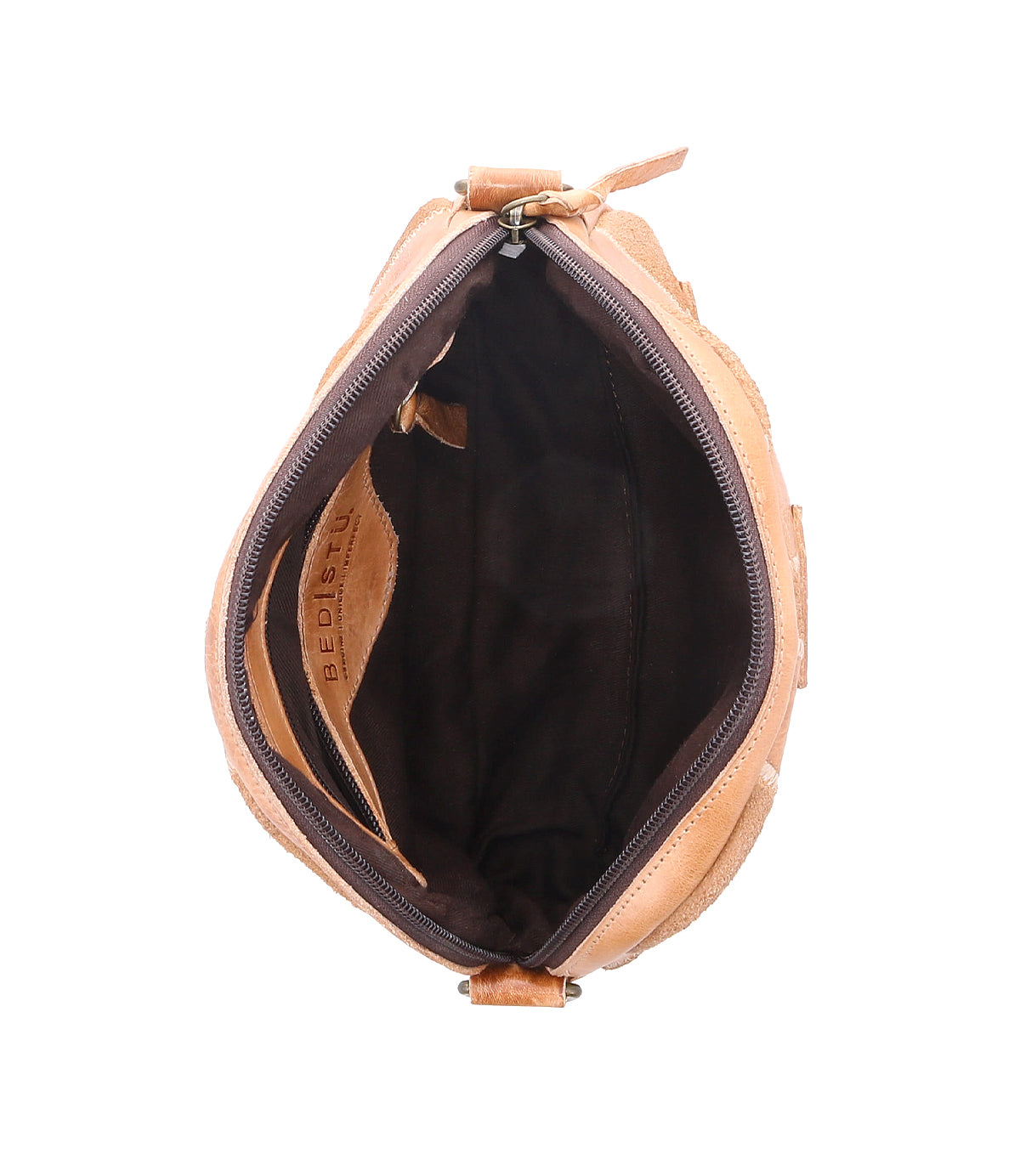 Top view of an open, empty Bed Stu Abundance tan leather sling bag showing a black fabric interior, isolated on a white background.