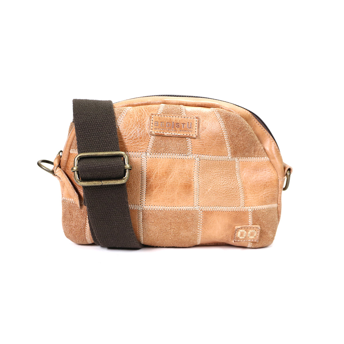 A small tan Abundance sling bag from Bed Stu with a brown strap and visible stitching, isolated on a white background.