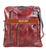 The Bed Stu Aiken is a brown leather convertible crossbody bag with multiple zippered pockets, an adjustable strap, and a bold "SOLD OUT" label across the front.