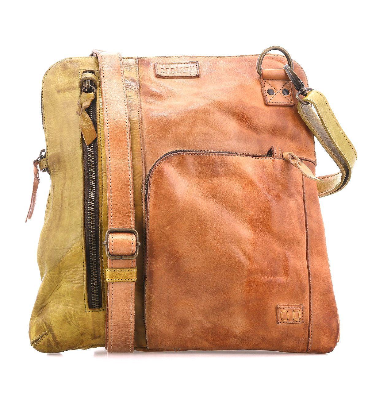 The Bed|Stü Aiken is a square, two-tone full-grain leather bag featuring a front pocket, adjustable strap, and zipper accents for style and durability. Designed with anti-theft security elements for your peace of mind, the Aiken is shown against a white background.