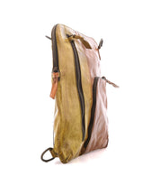 Side view of the Bed Stu Aiken convertible crossbody bag with two zippered compartments, one light brown and one greenish-brown, plus an adjustable, removable strap.