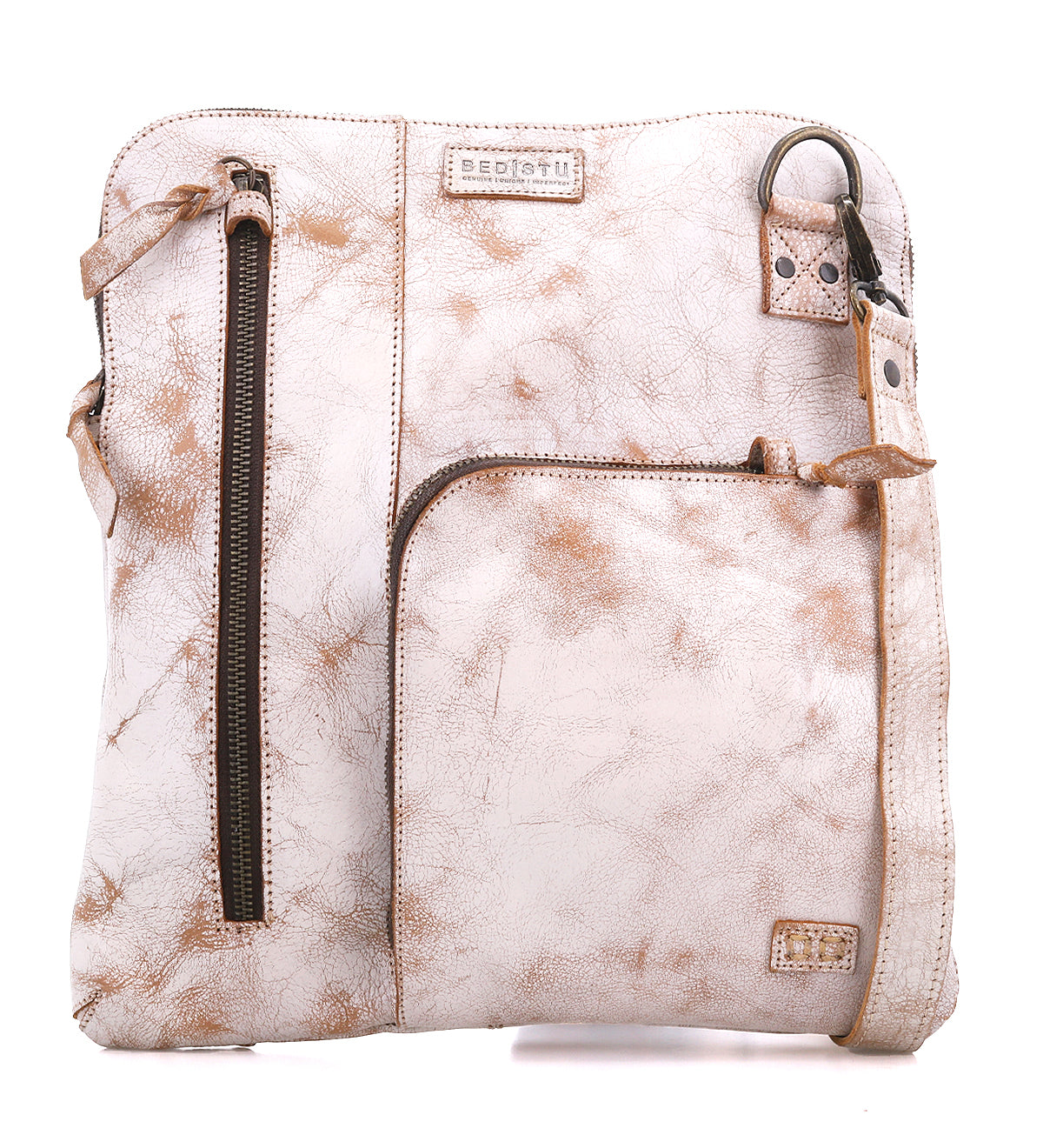 The Aiken crossbody bag by Bed|Stü features light brown full-grain leather, two front zippered pockets, an adjustable and detachable strap, visible stitching details, and built-in anti-theft security features.