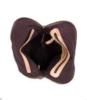 Top view of the Bed Stu Aiken bag: an open brown fabric bag with tan full-grain leather trim, two interior compartments, zippered pockets, and an adjustable strap for convenience.