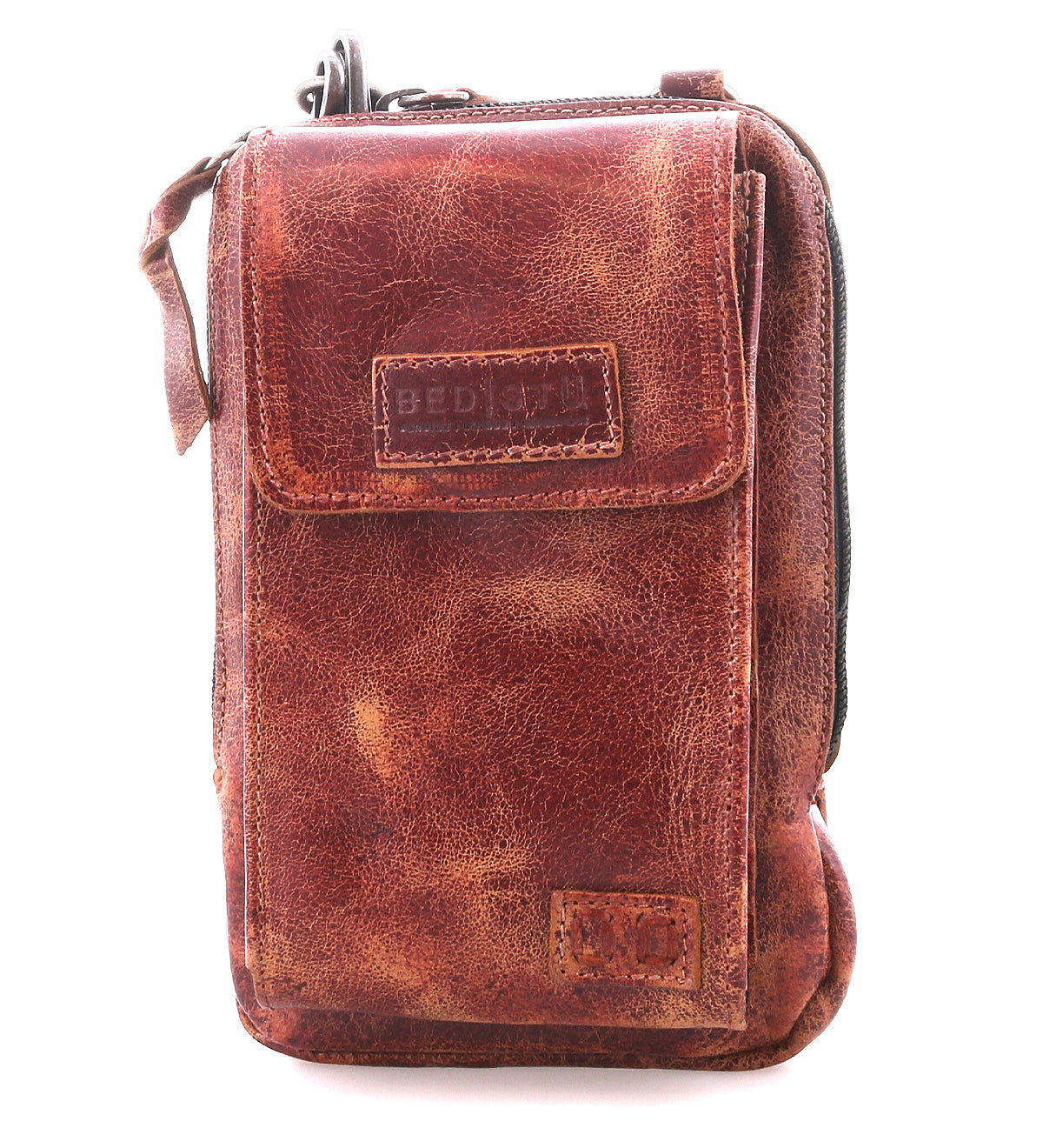 The Bed Stu Alelike is a compact, brown distressed leather crossbody bag with flap and zipper closure, visible stitching, and textured finish—ideal for carrying your phone in style.