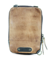The Alelike by Bed Stu is a premium leather zippered pouch in brown, featuring a small black label at the bottom and two zipper pulls on the right side, perfect for daily functionality.